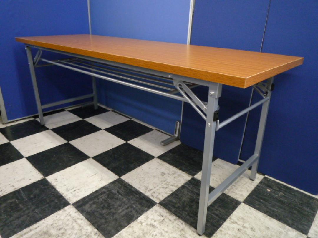 折り畳みテーブル■天板1800×600mm■チークブラウン木目■催事・会議用に
                        折り畳みテーブル
                                    新古品
            