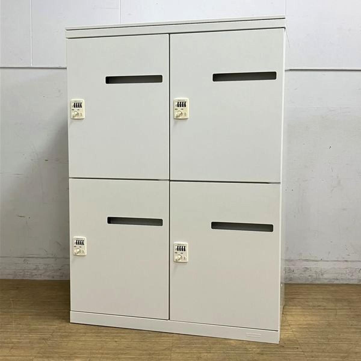 【在庫入替セール】オカムラ　レクトライン　4人用メールロッカー　ダイヤル錠　ホワイト天板付き　暗証番号検索キーは別途費用　※錠前部分に日焼けあり・扉部分に若干目立つ打痕あり
                        レクトラインロッカー
                                    中古
            