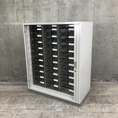 【書類・備品整理の必需品！シャッター戸付きの珍しいクリスタルトレー！】■イトーキ（ITOKI）製　シンラインシリーズ（THIN LINE）　クリスタルトレー　■3列（浅型1段＋深型10段）　■シャッター戸付き　■シリンダー錠　■グレー　【激レア！】【T3】